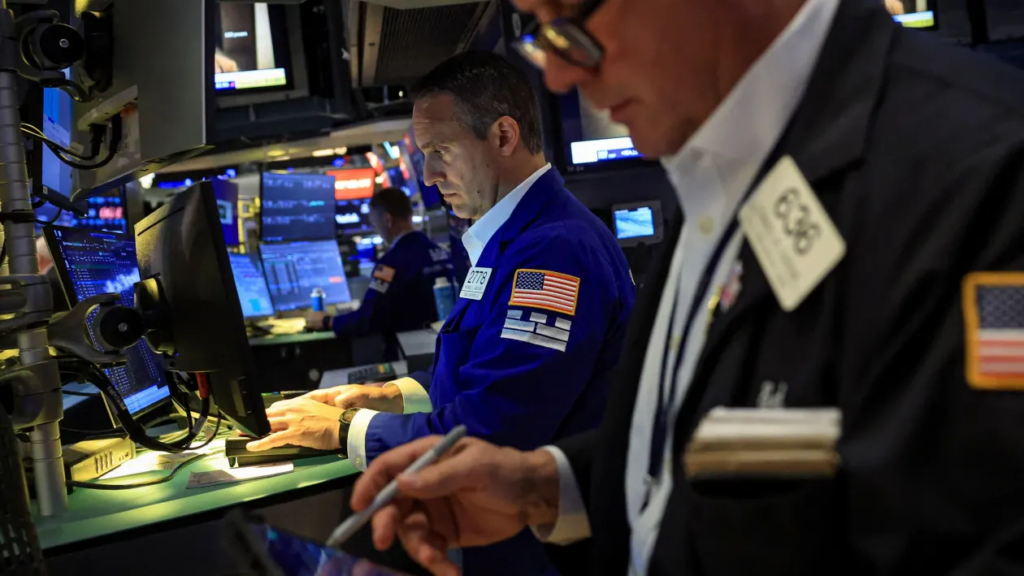 Traders work on the floor at the New York Stock Exchange (NYSE) in New York City, U.S., June 22, 2026.
Brendan McDermid | Reuters